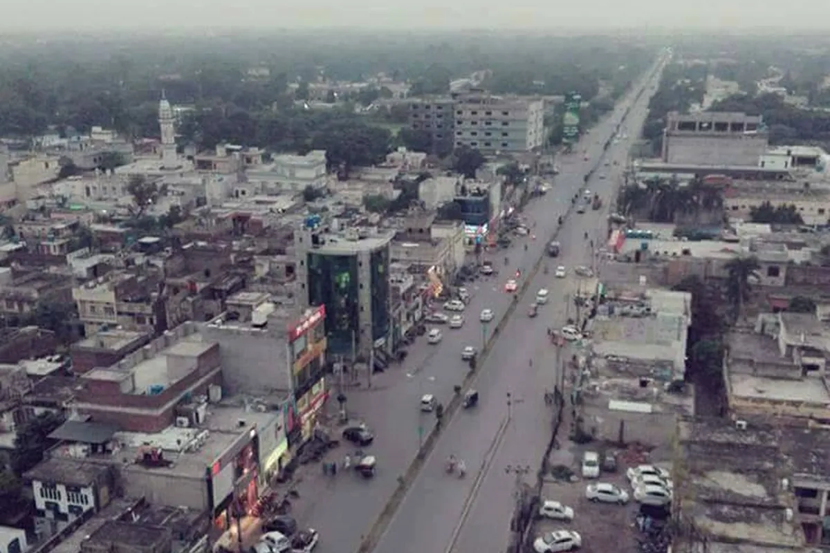 A wide boulevard running through Sialkot, seen from above