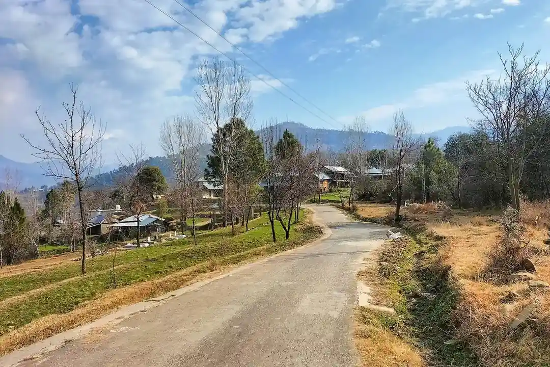 A rural road through a village in Azad Kashmir