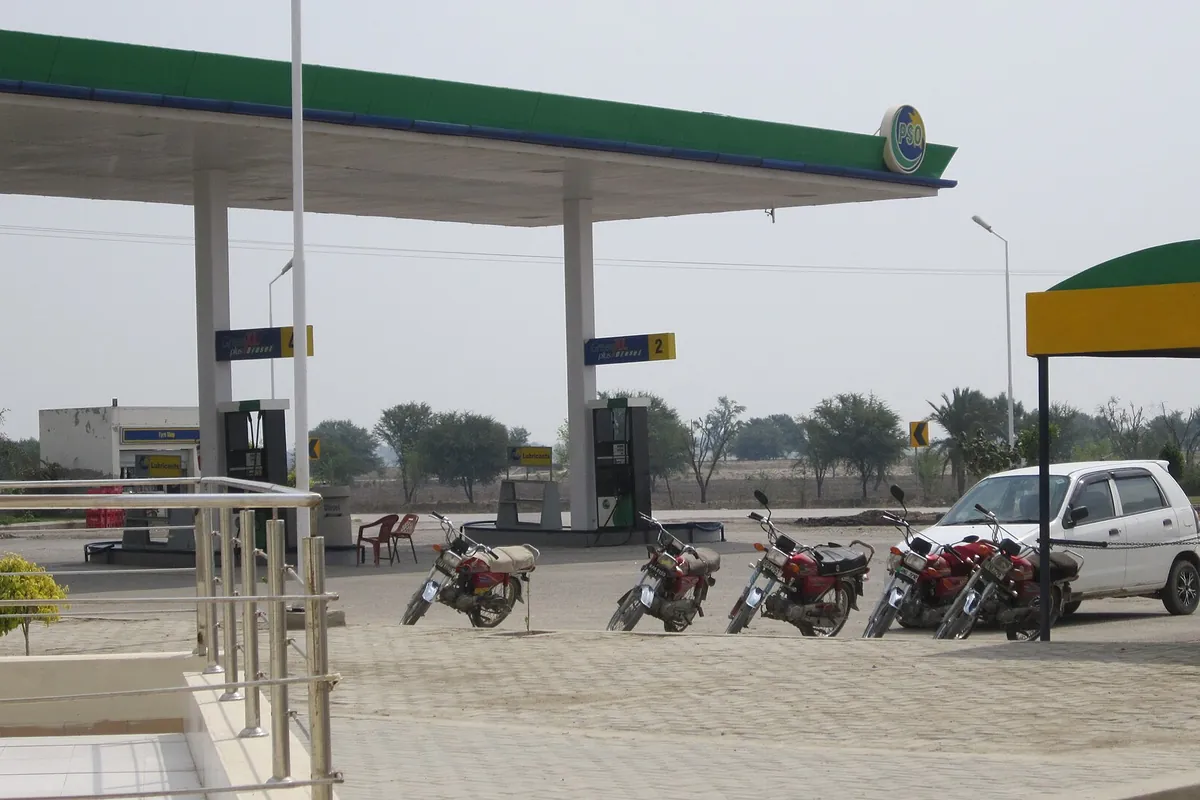 A Pakistan State Oil petrol station in Pakistan with diesel pumps and motorcycles