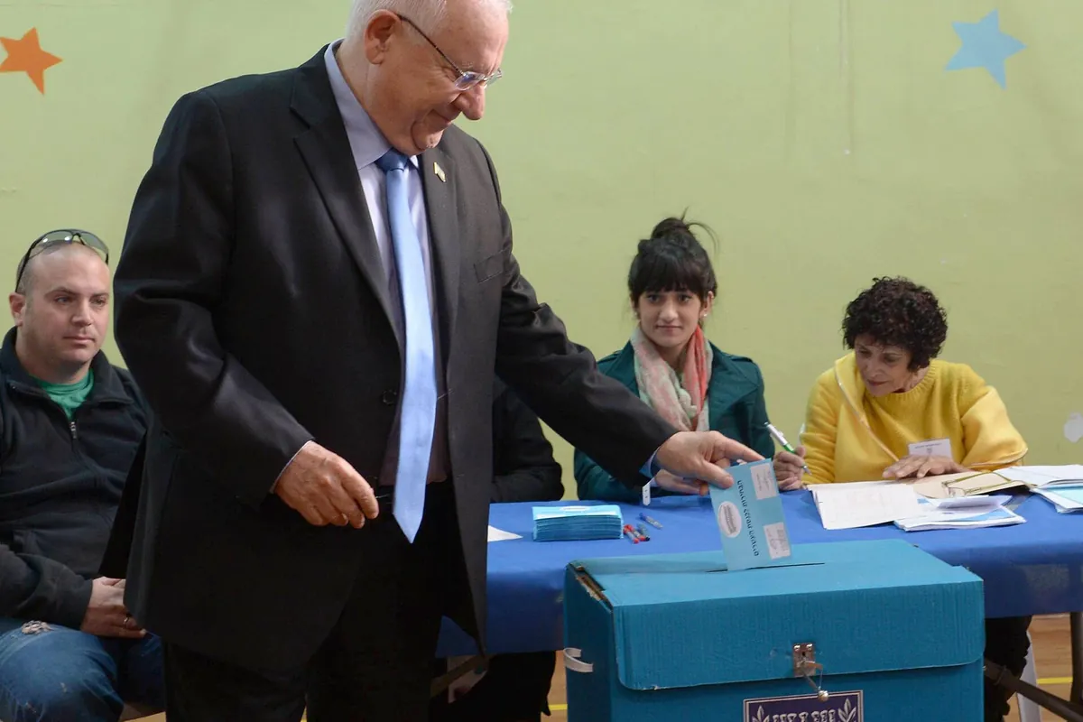 Former Israeli president Reuven Rivlin casting his ballot in a previous Israeli election