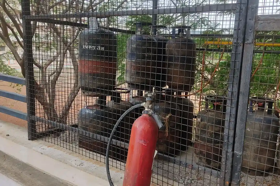 LPG cylinders stored in a locked outdoor cage