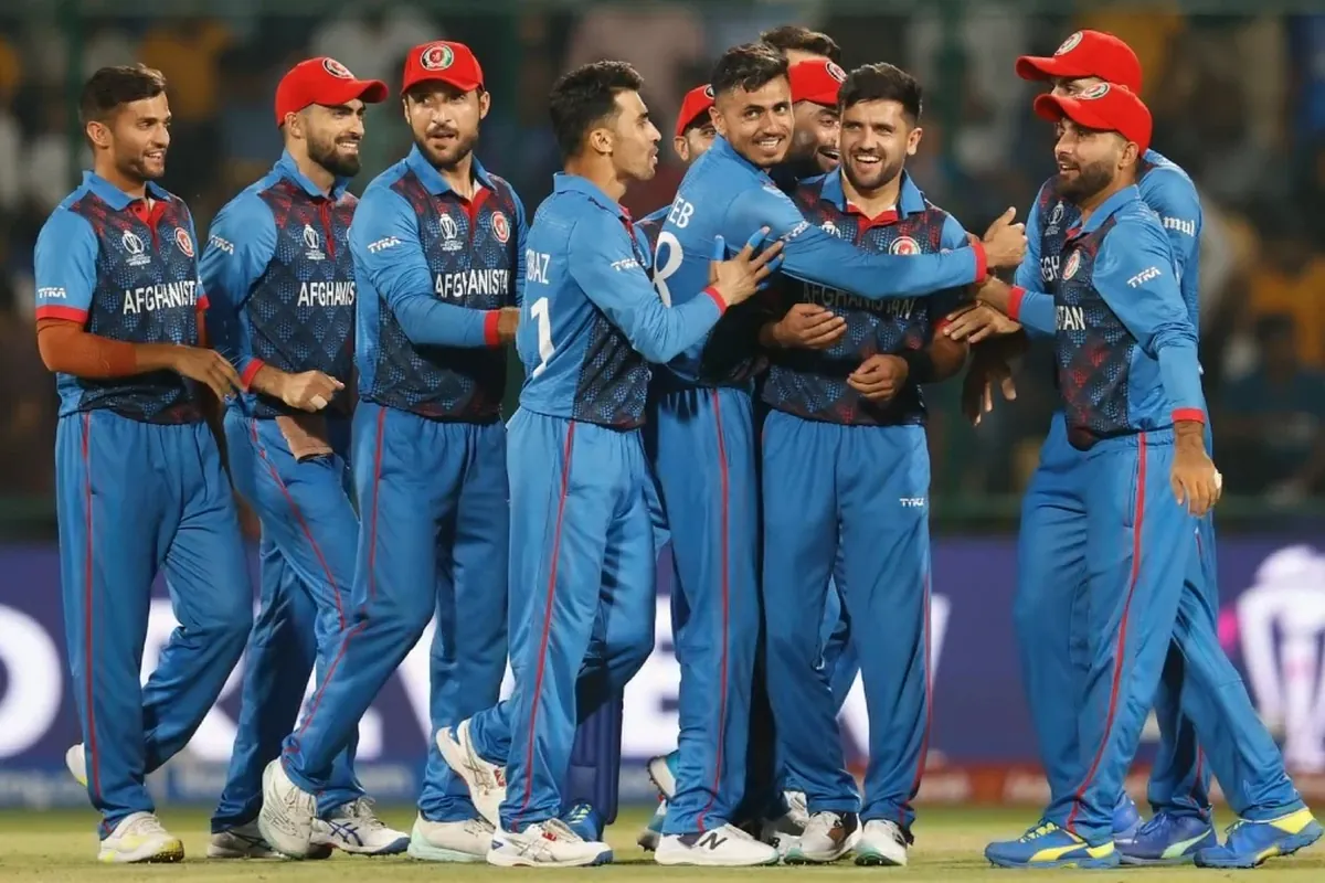 Afghanistan cricket team celebrating together on the field