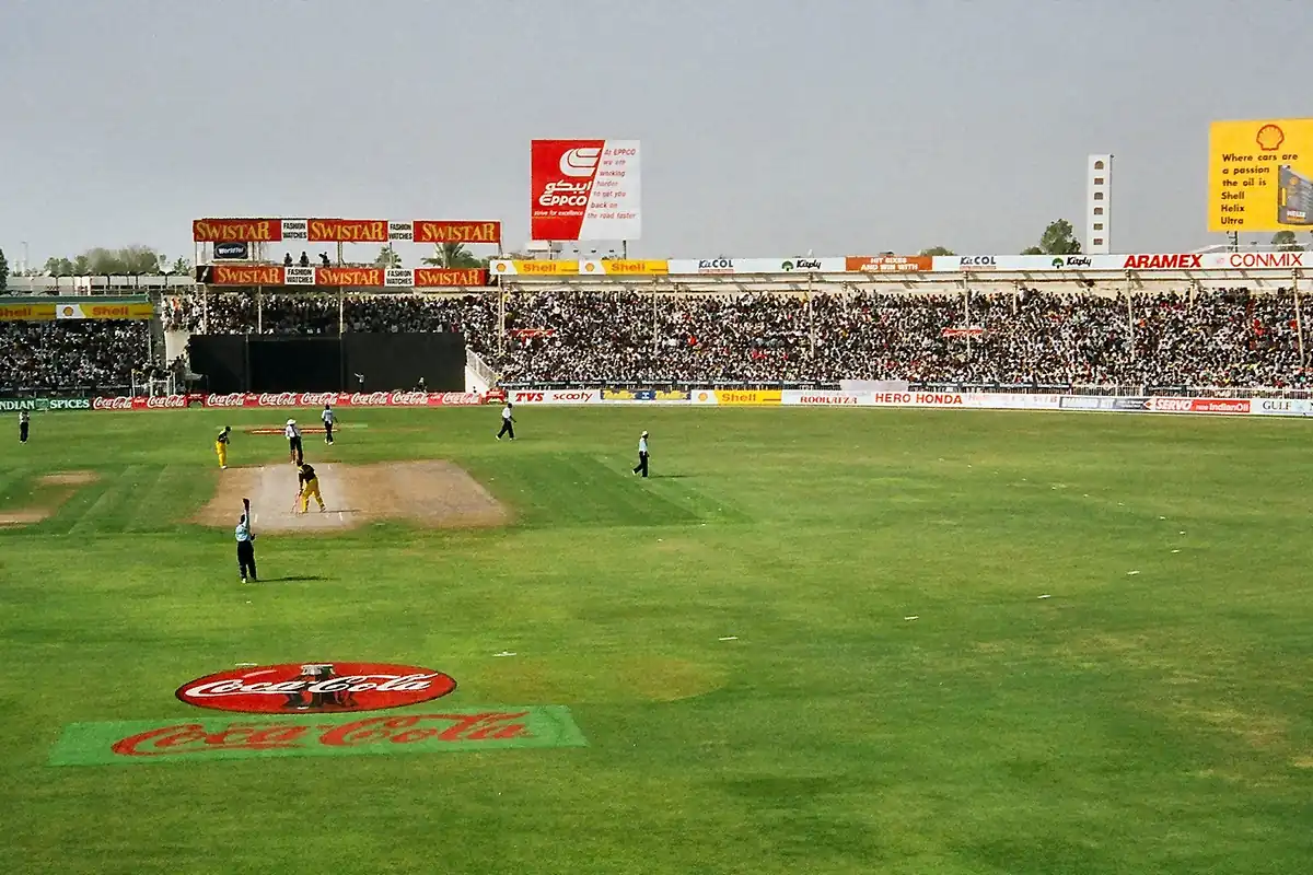Sharjah Cricket Stadium during a match, packed stands