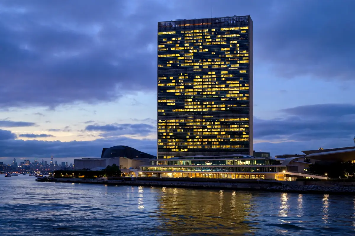 United Nations headquarters building in New York at dusk